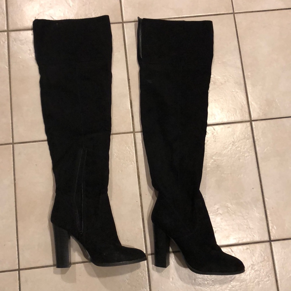 Black tall over the knee boots